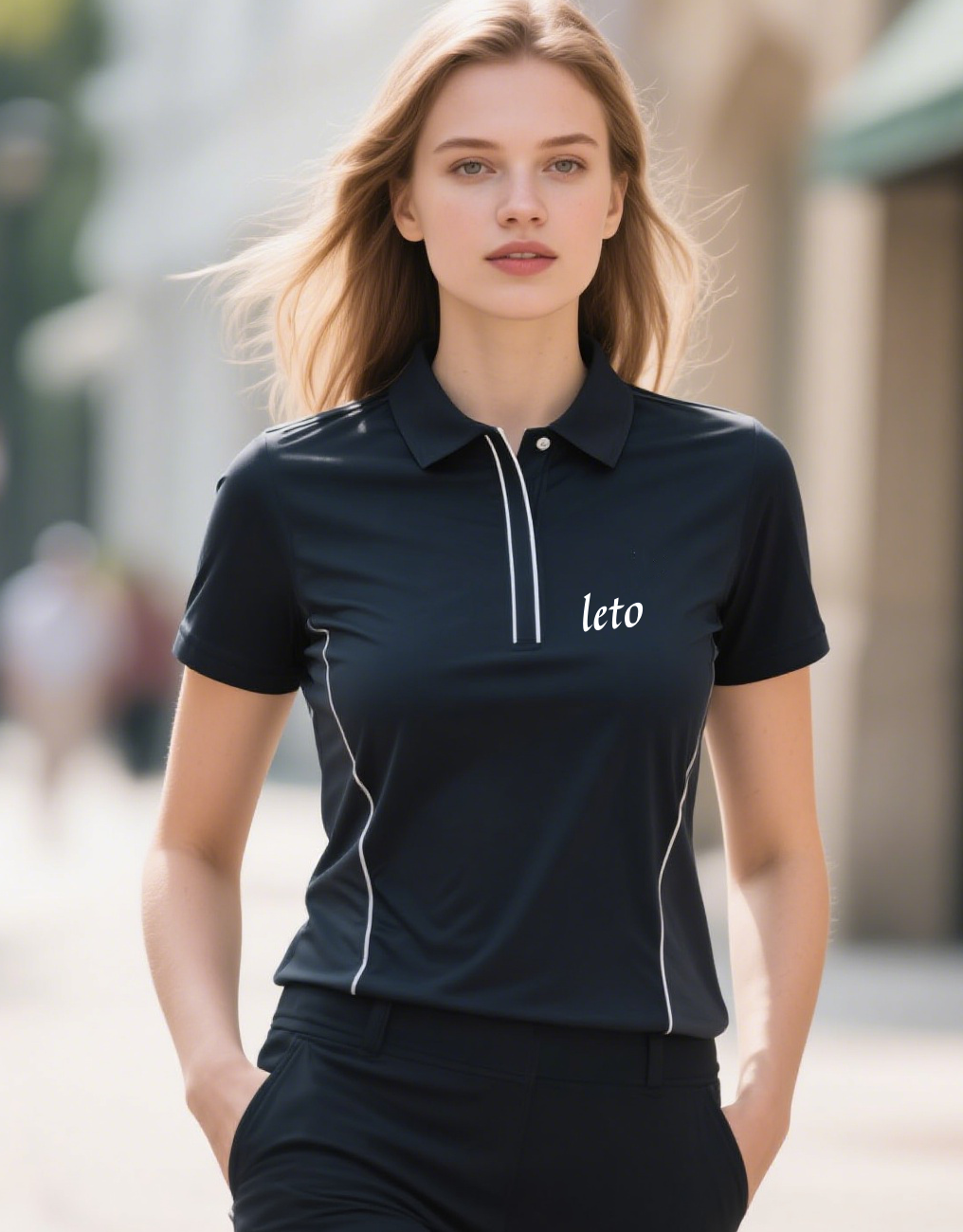 A collection of custom-designed golf shirts and polos crafted by a premium golf fashion manufacturer, displayed neatly on a rack.
