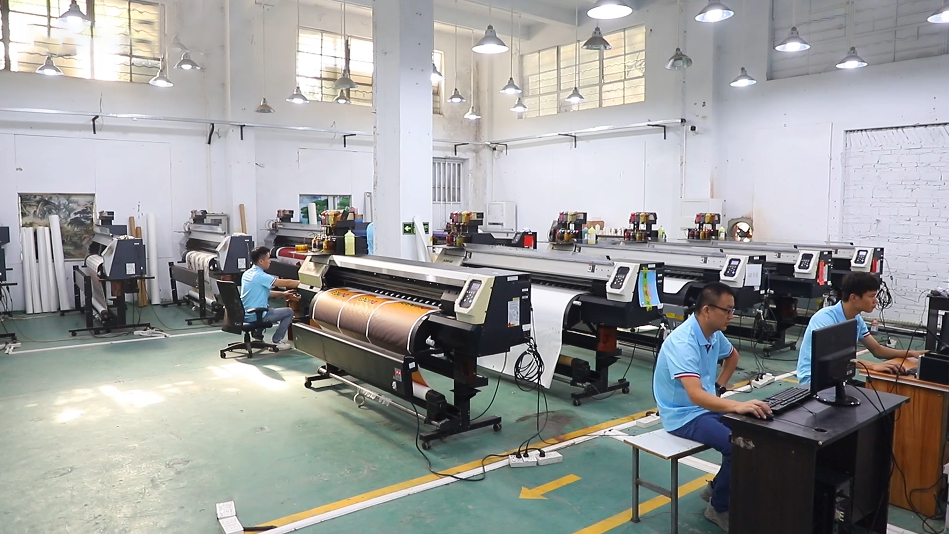 A handshake between a golf apparel brand owner and a manufacturing partner, with a backdrop of premium golf shirts and production equipment